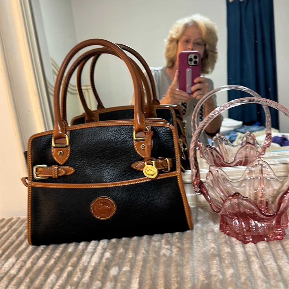 Dooney and Bourke all weather leather black and tan shoulder or tote bag